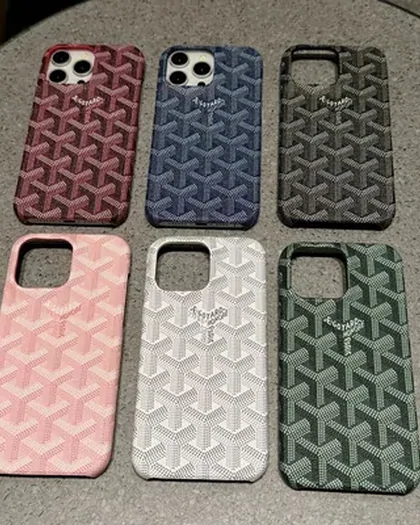 Four patterned phone cases in red, gold, black and blue