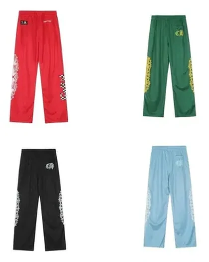 Four pairs of mesh track pants in red, green, black and pale blue, each with a side print